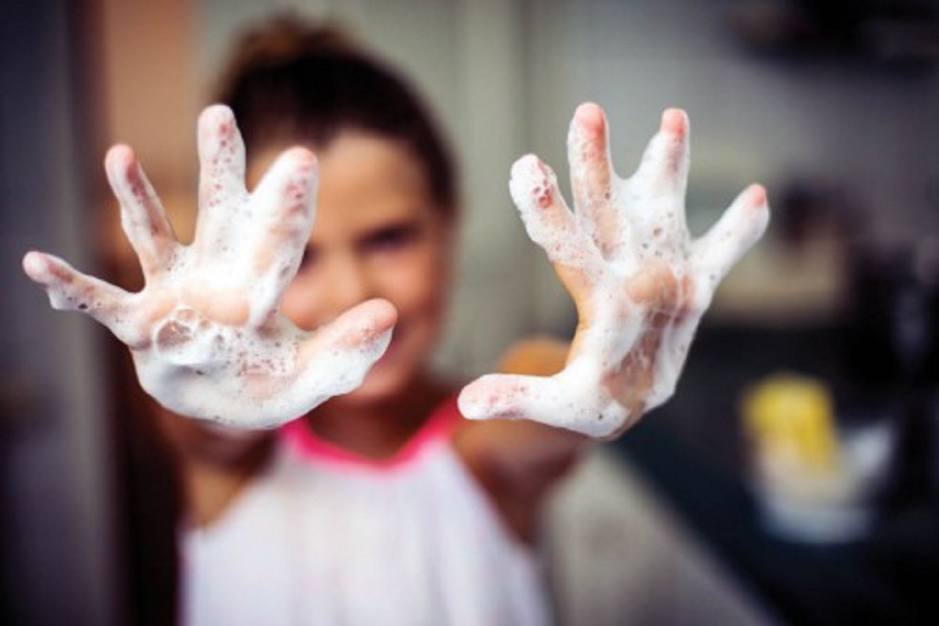 girl washing her hands