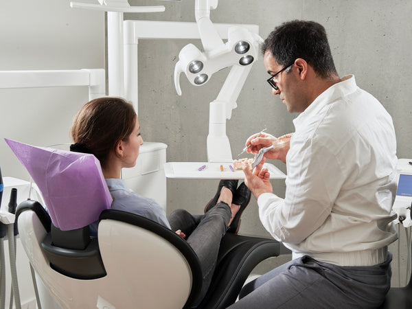 dentist and patient discussing periodontal disease