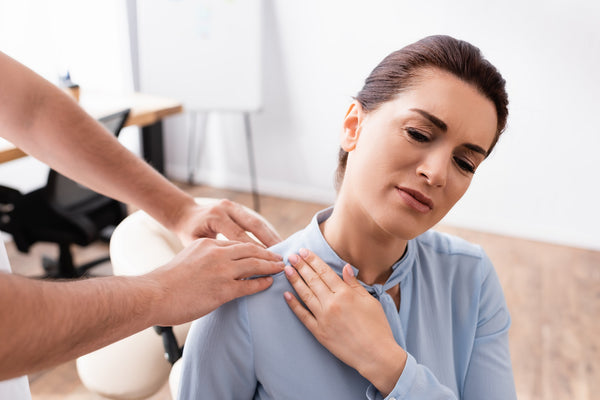woman receiving pain management therapy