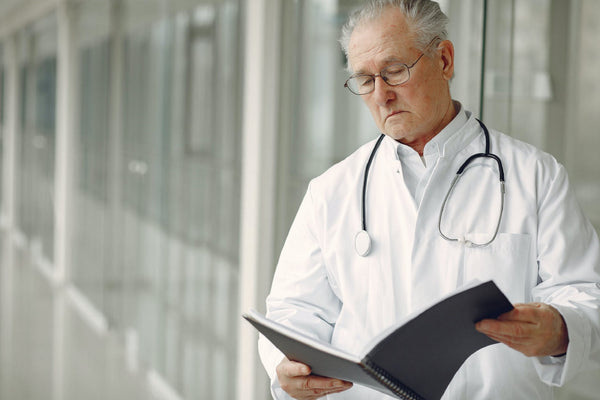 doctor looking at patient notes