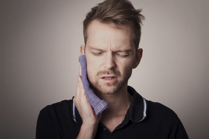 What Factors Can Cause TMJ Symptoms?