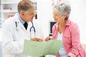 old woman getting check of aging issues by a doctor