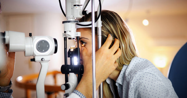 woman undergoing eye test