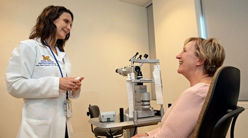 old woman being checked to keep aging eyes healthy