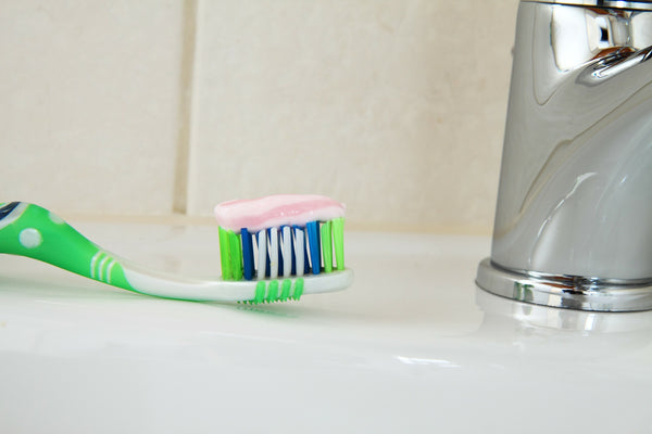 toothbrush and toothpaste fluoride dangers