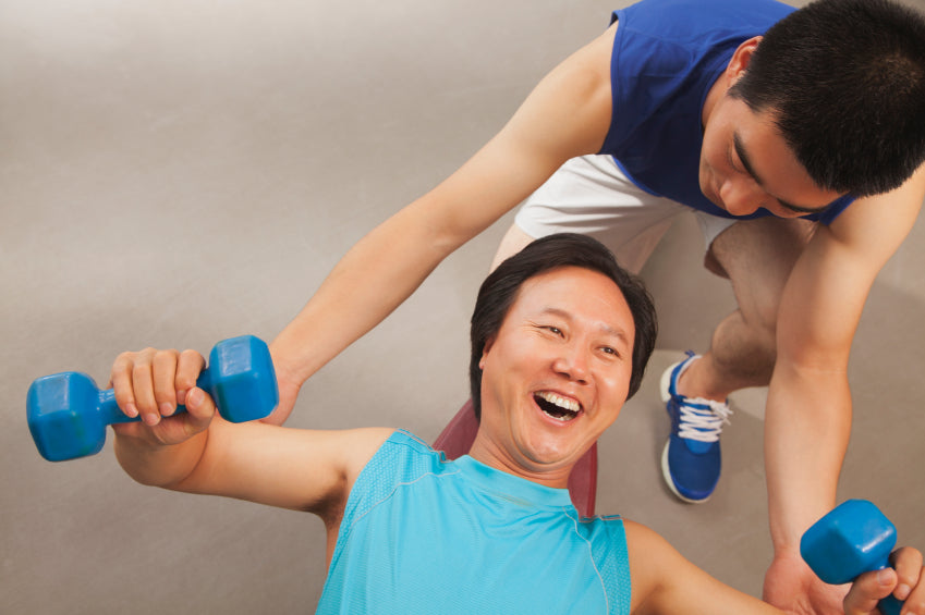 man performing dumbbell flys