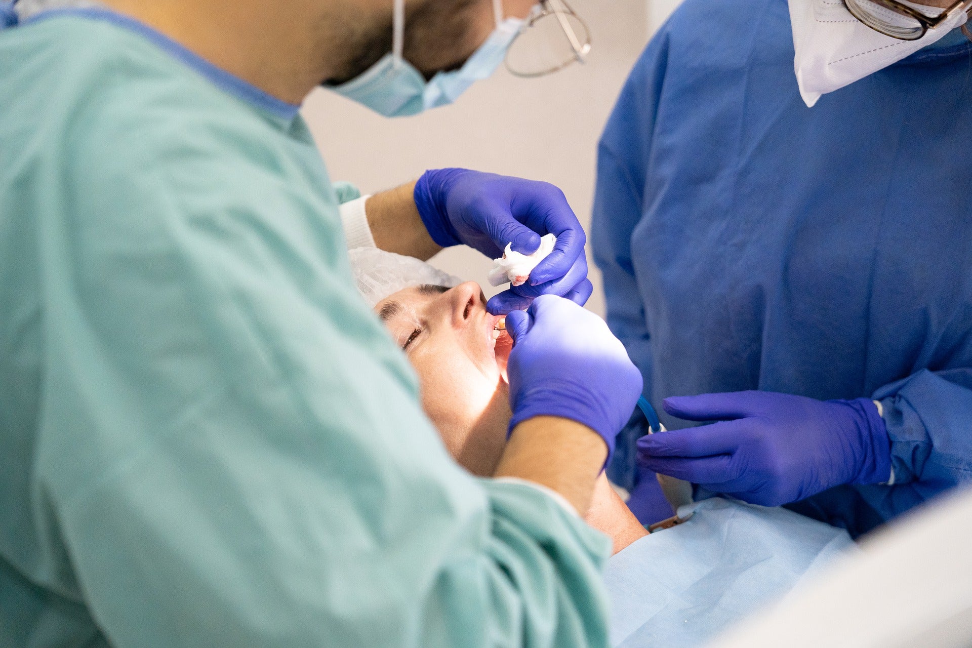 dentists replacing a missing tooth