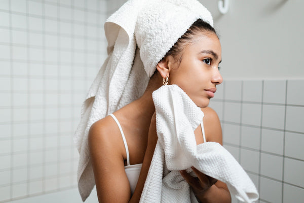 woman treating scalp eczema