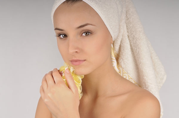 woman using salicylic acid for smooth skin