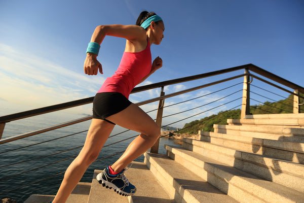 woman climbing stairs for exercise