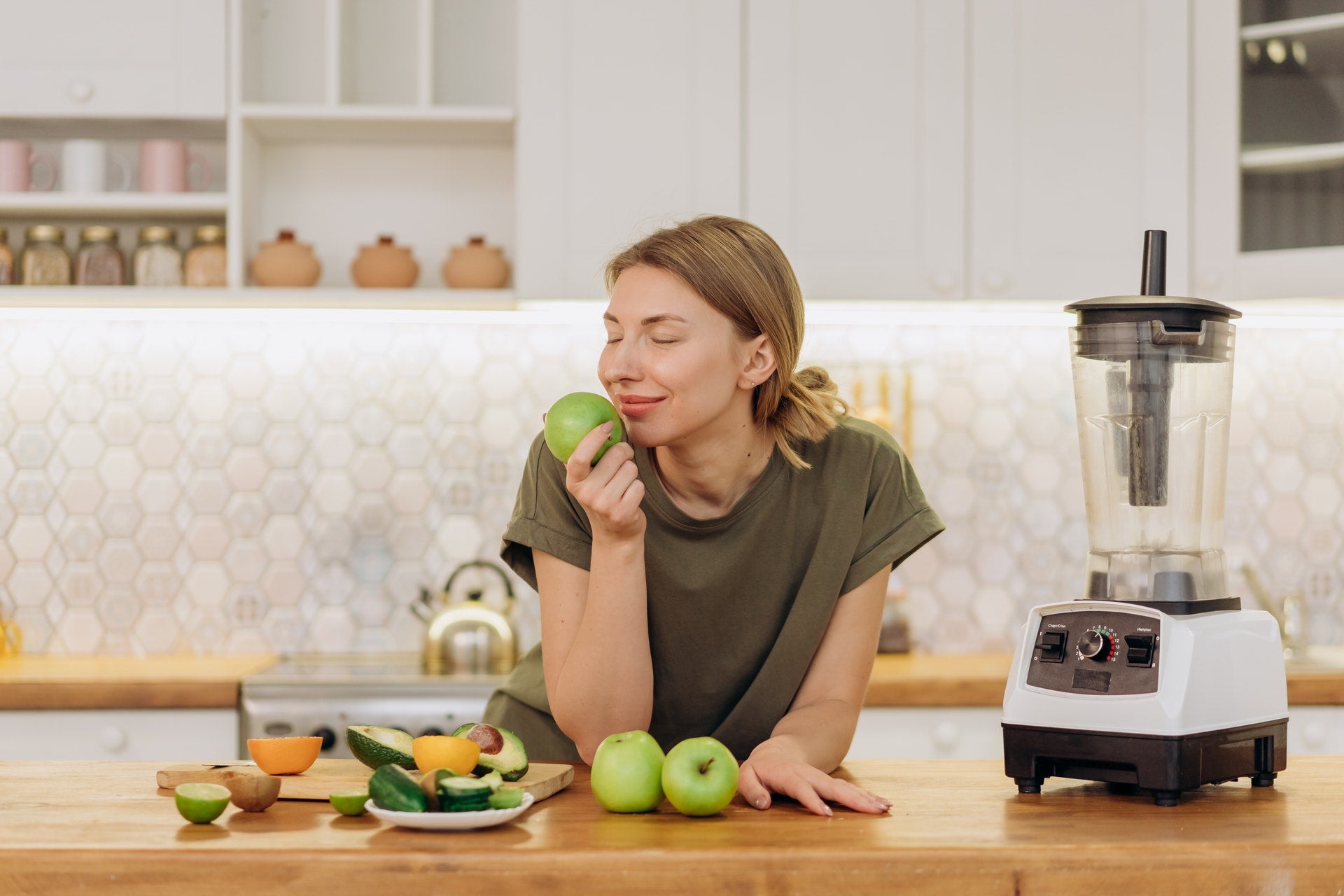 woman eating healthy fruits and vegetables