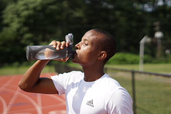 man drinking clean water to stay healthy and keep hydrated
